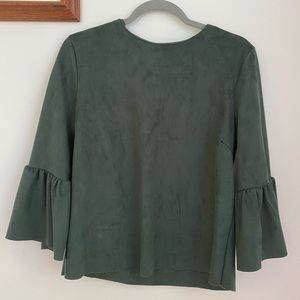 Evergreen peplum velvet top